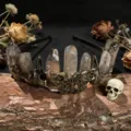 Close-up detail of gothic crystal crown headband with raw quartz and bronze butterfly decor. - Smoky Quartz + Antique Bronze Crow & Butterfly