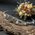 Close-up detail shot of the handmade crystal moon tiara, showing exquisite wire wrapping. - Black Rutilated Quartz + Moon