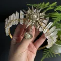 Exquisite details of the golden sun goddess crystal tiara, featuring raw quartz and pearl pendant. - White Raw Stone Gold Sun