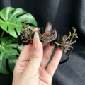Close-up of gothic crystal crescent moon headband with branch design, perfect for dark fantasy cosplay. - Moon Branch Crown Headband / Brown (Brown Crystal)