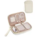 Detailed view of beige quilted electronics travel organizer showcasing internal mesh pockets. - Beige