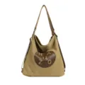 Sac à bandoulière en toile décontracté et élégant sac à dos convertible pour femmes. - Kaki