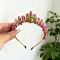 Detail shot of crystal crown headband with gold wire and bee decor for women fashion. - AB Red With Gold Bee