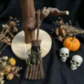 Detail shot of Halloween miniature broom ornament with metal spider charm and display stand. - Spider Charm Style / 13*4cm