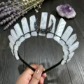 Detail view of a white quartz crystal crown headband with a black moon accent for daily style. - Clear Quartz And Black Moon