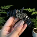 Detailed view of black crystal tiara with vintage bronze butterfly, gothic hair piece. - Black and Antique Bronze Butterfly