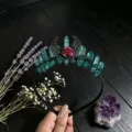 Gothic crystal tiara headband featuring teal crystal points, crescent moon and red rose design. - Green and Black Wire and Antique Bronze Hollow Moon Flower