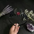 Detailed view of gothic black crystal moon flower headband, exquisite metal and rose design. - Black and Black Wire and Antique Bronze Hollow Moon Flower