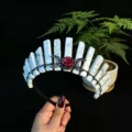 Crystal crown headband detail showing white stone pillars, red rose and moon charms. - White Turquoise + Black Moon + Flower