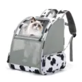 Breathable cow print pet backpack with mesh windows for portable cat travel and outdoor hiking - White