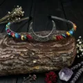 Close-up detail of the handmade crystal moon headband, featuring colorful healing stones. - Colorful Shell With Moon