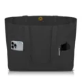 Black canvas tote bag detail showing front pockets and metal snap closure design. - Black
