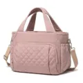 Quilted lunch bag detail showing front zippered pocket, durable handles and adjustable strap. - 29.5 x 6.5 x 23CM / Lotus Pink