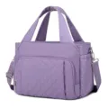 Purple quilted insulated lunch bag detail view, showing soft fabric and metal hardware. - 29.5 x 6.5 x 23CM / Purple