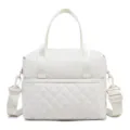 Quilted detail view of the insulated lunch bag, showing durable nylon fabric and fine stitching. - 27 x 17 x 22CM / Off White