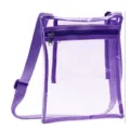 Clear crossbody bag with purple trim, adjustable strap and front zipper pocket for events. - Purple