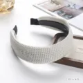 Chic off-white knitted headband for women, wide winter hair hoop, cozy solid color hair accessory. - Off White