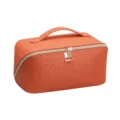 Orange woven cosmetic bag with top handle and dual zippers for travel storage and daily use - Orange