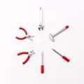 Miniature dollhouse alloy tool set, 1:12 scale detailed view showing tiny hammers and pliers. - Red