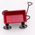 Miniature red iron cart dollhouse accessory, detailed metal wagon model for photography props. - Red