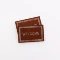 1:12 maison de poupée miniature tapis bienvenue marron non-tissé micro paysage accessoire photo - Marron brillant avec impression blanche