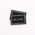Tapis miniature 1:12 pour maison de poupée, tapis noir non-tissé Welcome pour décoration - Gris foncé avec impression blanche