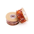 Ethnic style core-spun cord detail shot, colorful braided rope for handmade DIY crafts. - Orange
