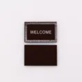 Détail de paillasson miniature pour maison de poupée avec texte welcome échelle 1:12 - Café foncé avec impression blanche