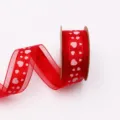 Red heart polyester ribbon roll for gift packaging, craft decoration, and party supplies. - Red