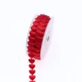 Close-up detail of red heart ribbon roll, satin fabric heart shaped trim for gift wrapping. - 15mm / Red