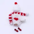 Close-up of miniature doll knitted clothes set, including sweater, scarf, hat and cute shoes. - Matching 4