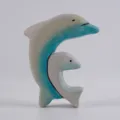 Handmade wooden dolphin figurine set, cute animal carving ornament for home and room decor. - Two Dolphins