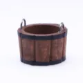 Detail shot of miniature wooden bucket model with metal handles for dollhouse props. - Coffee