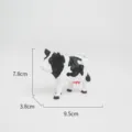 Statua di mucca geometrica in legno variante da scrivania, regalo decorativo creativo. - Piccola Mucca
