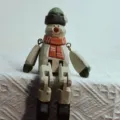 Handmade wooden snowman Christmas ornament desktop decor with movable jointed arms and legs. - Orange Scarf Shelf Sitter