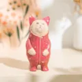 Handcrafted wooden cat figurine wearing pink onesie, creative desktop ornament for home decor. - Retro Cat in Red Clothes
