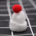 Mini knit wool hat variant, white with red pompom, perfect for DIY hair clips and accessories. - White