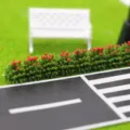 Detail van miniatuur groene struikstrip voor poppenhuis micro landschap zandtafel decoratie scène. - Rood