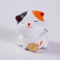 Handmade wooden carved lucky cat ornament with gold ingot, cute animal desktop decor. - Calico Cat