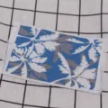 Miniature dollhouse floor rug with blue tropical palm leaf pattern for tiny scene decor - Coconut Tree
