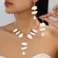 Gold-tone white enamel pebble drop oil necklace and long earrings set for party details. - 2-Piece Necklace & Earrings Set / White