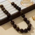 Collier de perles sombres rétro chaîne clavicule style européen élégant bijoux pour femmes - Marron (JMX-XL9681)