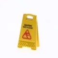 Detailed close-up shot of miniature yellow caution wet floor warning sign dollhouse prop. - Caution Wet Floor (Single-Sided Pattern)