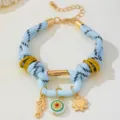 Bracelet coloré en corde tressée style océan avec pendentifs hippocampe soleil bijoux de plage femme - Bleu clair
