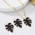Ensemble de bijoux collier et boucles d'oreilles feuille de monstera métal or détail - Feuille en Émail (JMX-XL9436) / Noir