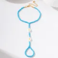 Blaue Perlen Gänseblümchen Fußkettchen Fußschmuck im Böhmen Stil Detailansicht Strand. - Fußkettchen mit Zehenring (JMX-JL9637) / Blau