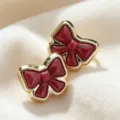Boucles d'oreilles clous noeud rouge exquises avec bordure dorée, style mignon quotidien. - Bordeaux