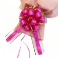 Large pink pull bow for gift wrapping, wedding car decor, and Christmas tree decoration. - Rose Red