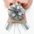 Large silver mesh gift bow with pink wrapping paper for Christmas and holiday decoration. - 10 Pieces Pack / Silver