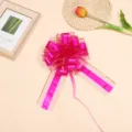 Large pink gold-edged decorative pull bow for gift wrapping, wedding car, and party decor. - 10 Strands Pack / Rose Red